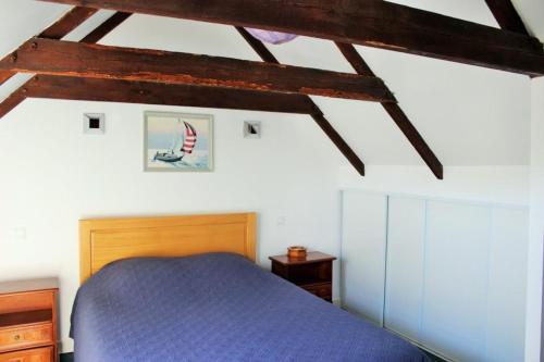 מיטה או מיטות בחדר ב-Sue's cottages