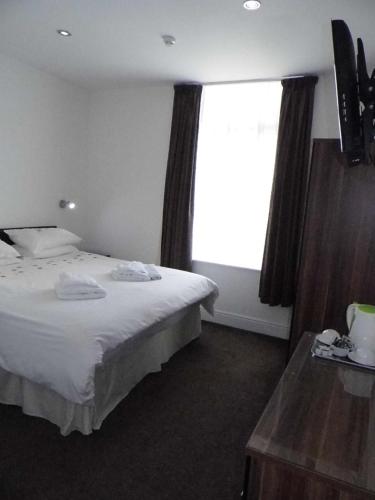 Katil atau katil-katil dalam bilik di The Kerswell Hotel Sea Front