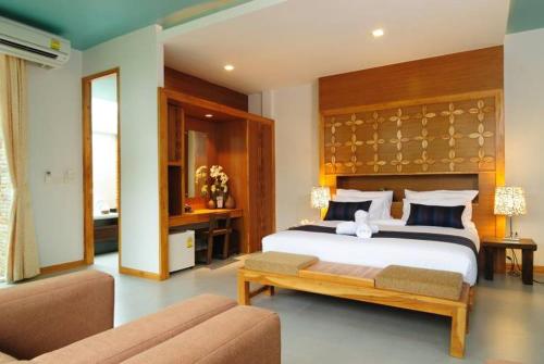 Postel nebo postele na pokoji v ubytování Nana Resort Kaeng Krachan
