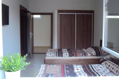 Ένα ή περισσότερα κρεβάτια σε δωμάτιο στο Motel Senec