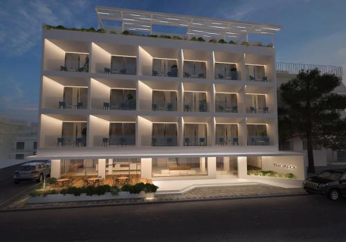 a rendering of a white apartment building with balconies at The Alex Monte Kastella, Santikos Collection in Piraeus