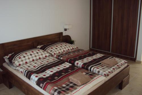 Ένα ή περισσότερα κρεβάτια σε δωμάτιο στο Motel Senec