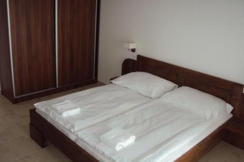 Ένα ή περισσότερα κρεβάτια σε δωμάτιο στο Motel Senec
