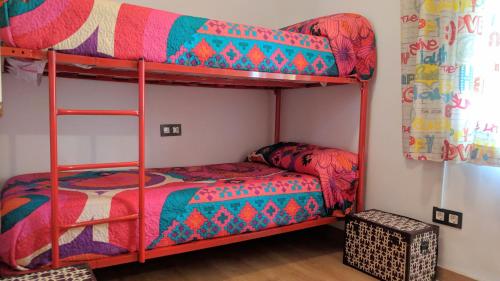 A bed or beds in a room at Los Caňos II - Calm Home - Option cheap parking