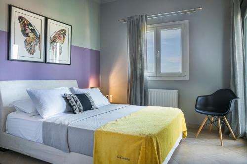 Postel nebo postele na pokoji v ubytování Athinais LAK Villa