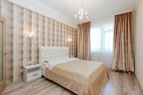 Кровать или кровати в номере Rightmove Apartments