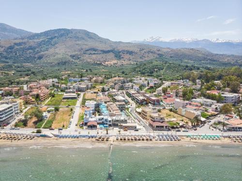 an aerial view of a resort on the beach at Mare Boutique in Georgioupolis
