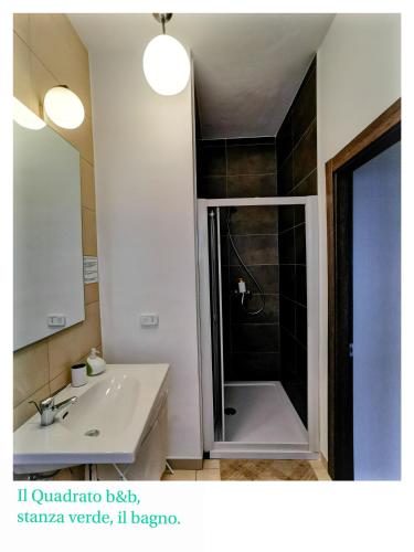 a bathroom with a shower and a sink at Il Quadrato Bed and Breakfast in Marina di Schiavonea