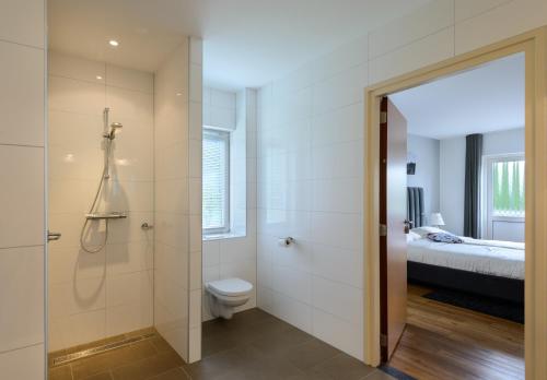 Kylpyhuone majoituspaikassa Hotel Bemelmans