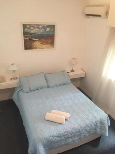 Łóżko lub łóżka w pokoju w obiekcie Aqua Hotel
