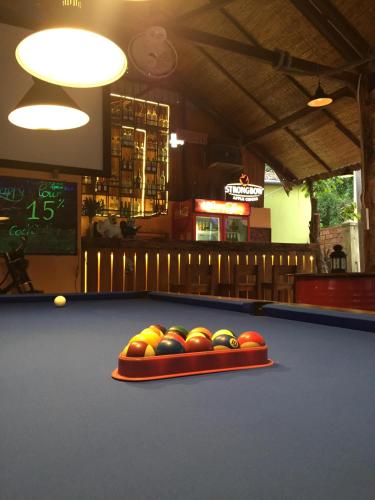 a tray of balls on a pool table at LANGCHIA HOME in Phu Quoc