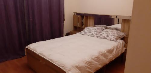 Postel nebo postele na pokoji v ubytování Apartamento T1 Canto dos Poetas