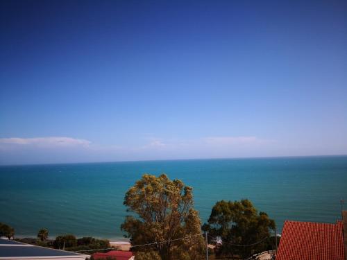 a view of the ocean from a building at Holiday Beach Lumia in Sciacca