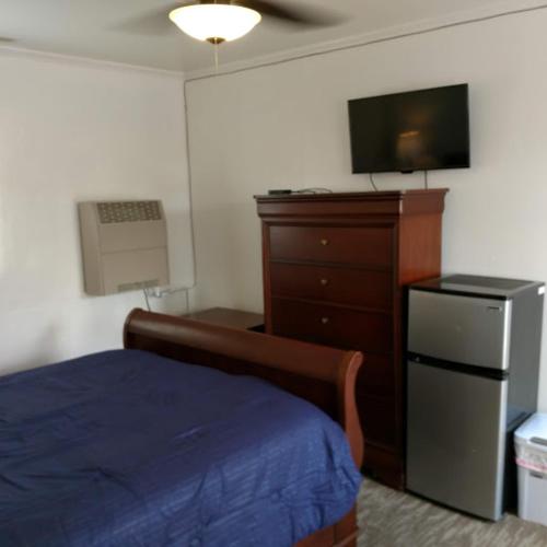 Ένα ή περισσότερα κρεβάτια σε δωμάτιο στο The Ohio Motel