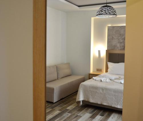 Gallery image of Psili Ammos Seaside Luxury Rooms in Astris