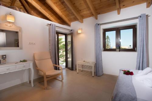 Ένα ή περισσότερα κρεβάτια σε δωμάτιο στο Houmeli Maisonettes & Apartments