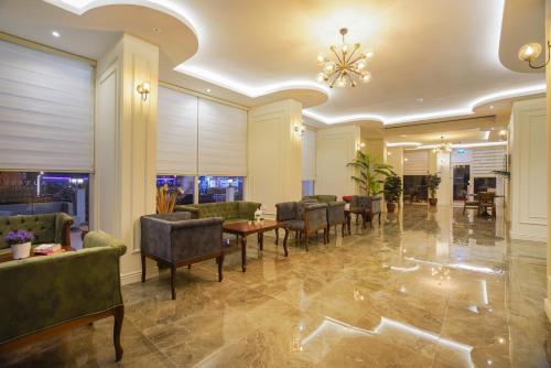 Χώρος καθιστικού στο Aurasia Sea Side Hotel