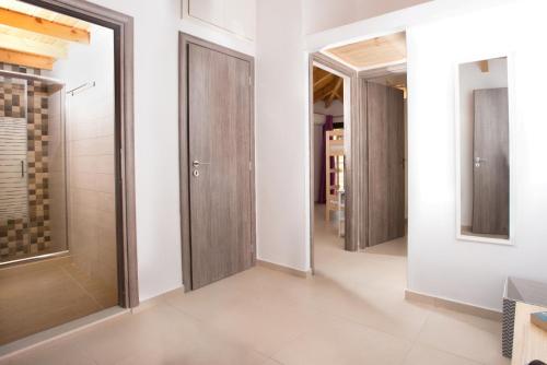 Ένα μπάνιο στο Houmeli Maisonettes & Apartments