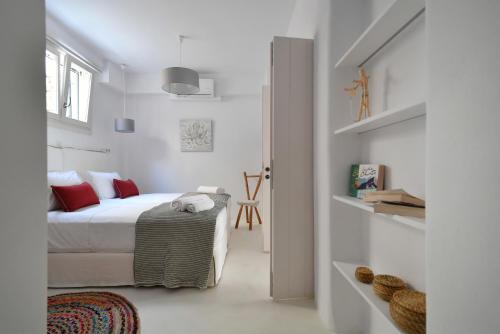 Postel nebo postele na pokoji v ubytování Ciel Villas Paros