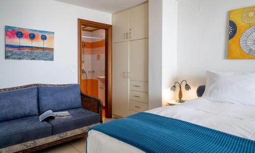 Ένα ή περισσότερα κρεβάτια σε δωμάτιο στο Loukia Apartments