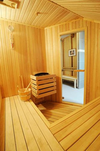 a inside of a wooden sauna with a window at Ekofarma Horní Chrášťany in Lhenice