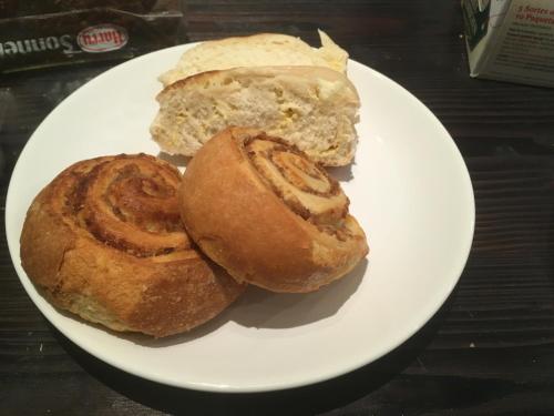 three pastries on a white plate on a table at Pension Waldesruh in Velden am Wörthersee