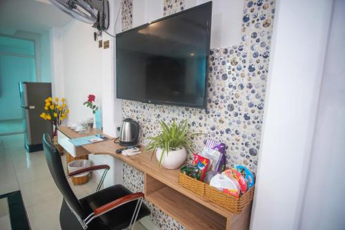 TV a/nebo společenská místnost v ubytování H79 HOTEL