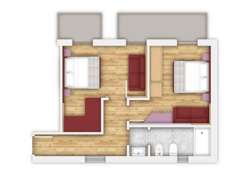 a floor plan of a house with red at Hotel Majorka in Andalo