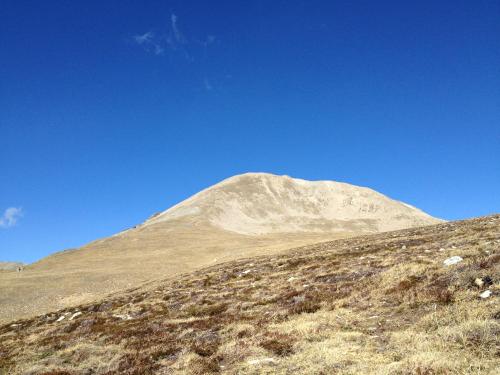 a mountain on top of a grassy hill at Casa Rural Mollo, Vall de Camprodon in Molló