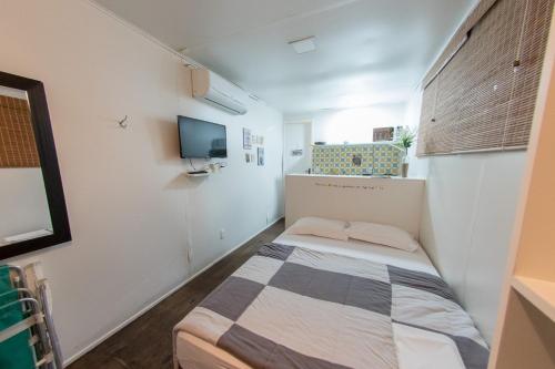 Ein Bett oder Betten in einem Zimmer der Unterkunft Capim Limão Village do Rosa