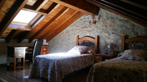 Postel nebo postele na pokoji v ubytování LAS VILLAS DEL PONTON