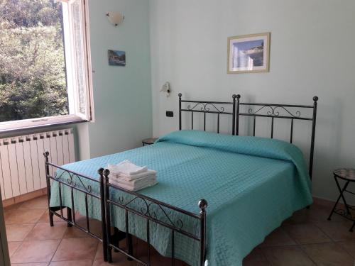 Postel nebo postele na pokoji v ubytování B&B Oasi Verde