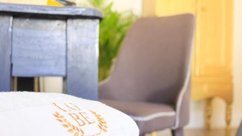 a chair with a pillow on top of a table at Casa LOBE in Ocosingo