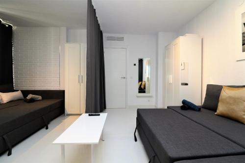 Postel nebo postele na pokoji v ubytování Carlos V 3-A Apartment Levante Beach