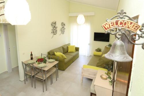 a living room with a couch and a table at Elia in Skála Foúrkas