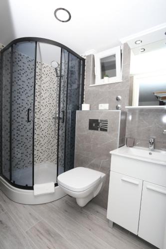 Ένα μπάνιο στο Apartman Kristian