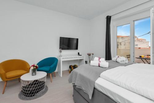 Postel nebo postele na pokoji v ubytování Apartments Morpheus