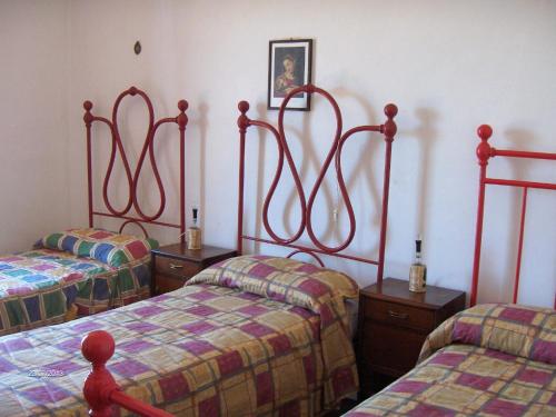 Voodi või voodid majutusasutuse Agriturismo Il Palazzetto toas