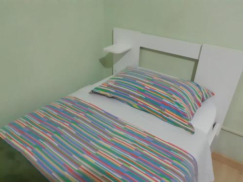Postel nebo postele na pokoji v ubytování Hospedagem UniCanto