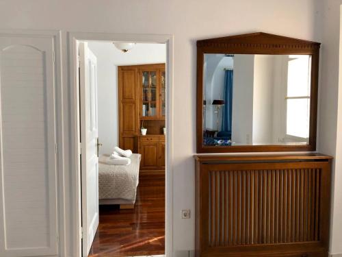 Ένα ή περισσότερα κρεβάτια σε δωμάτιο στο Villa Andros Époque