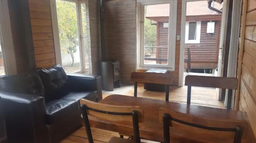 Χώρος καθιστικού στο Hotel y Cabañas Rural Mirador del Maipo