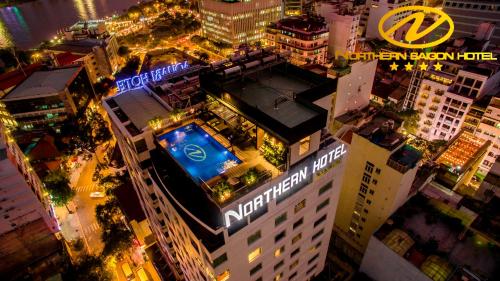 an overhead view of a city at night at Northern Saigon Hotel in Ho Chi Minh City