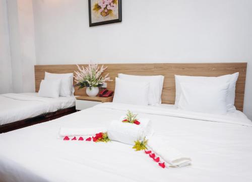 Postel nebo postele na pokoji v ubytování H79 HOTEL