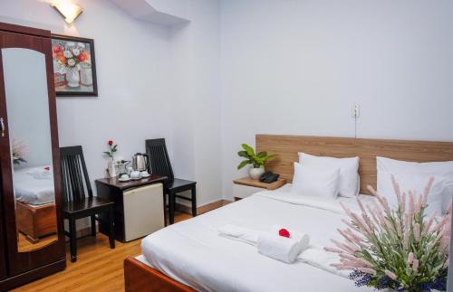 Postel nebo postele na pokoji v ubytování H79 HOTEL