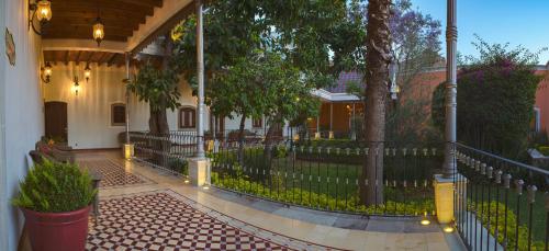 Сад в Villa Maria Cristina Hotel