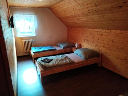 Postel nebo postele na pokoji v ubytování Penzion Zátiší