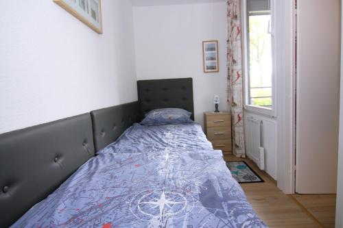 Postel nebo postele na pokoji v ubytování Ferienwohnung Marina Wendtorf App. 6110