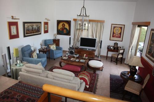 TV a/nebo společenská místnost v ubytování Residence L' Aubrais
