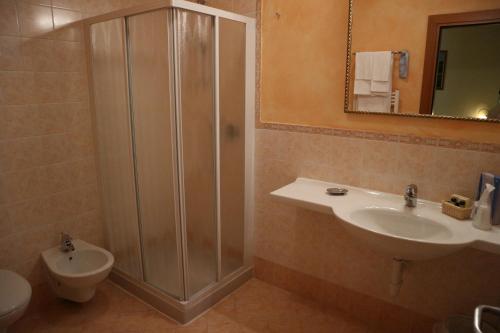 Koupelna v ubytování Hotel Camoretti