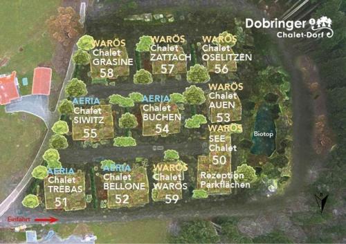 a map of a park with lots of signs at Dobringers Chalet-Dorf Warös in Hermagor